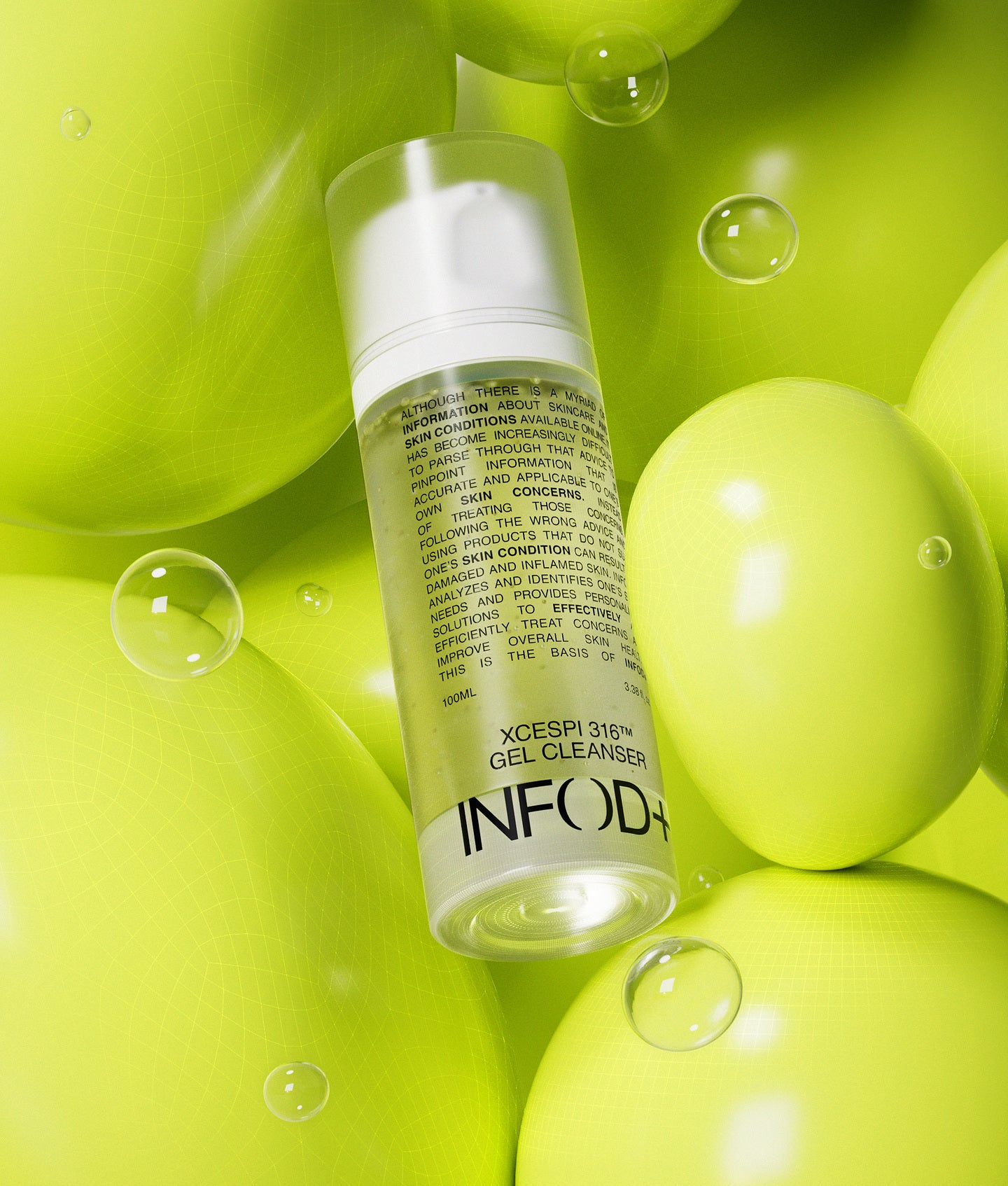 INFOD+, flacon pompe Xcespi316 Gel Cleanser au milieu de sphères vert anis et de bulles