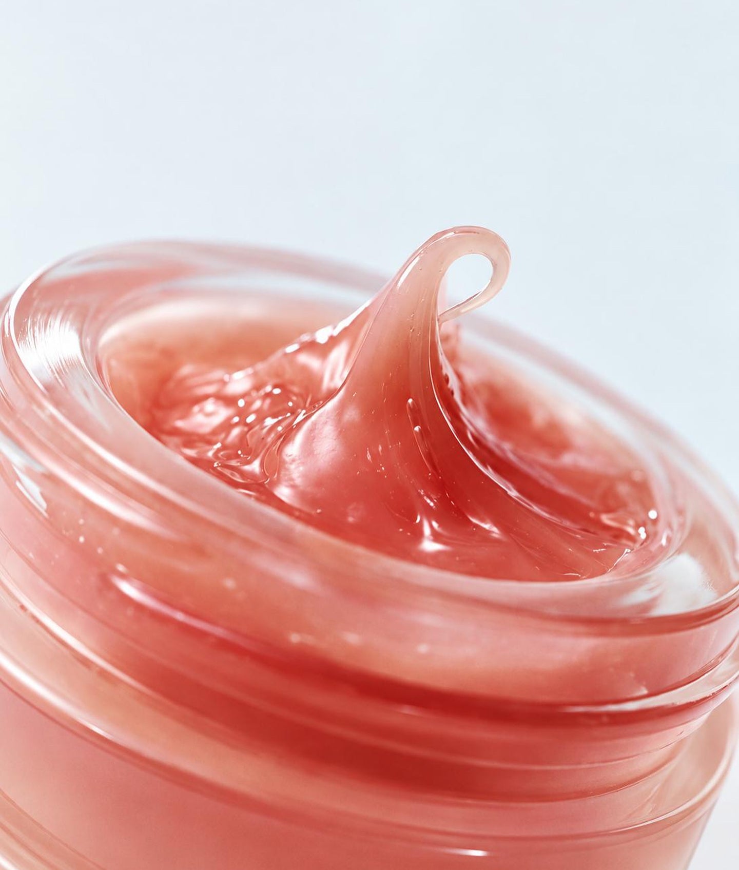LANEIGE, gros plan sur un pot ouvert de texture rose en gelée